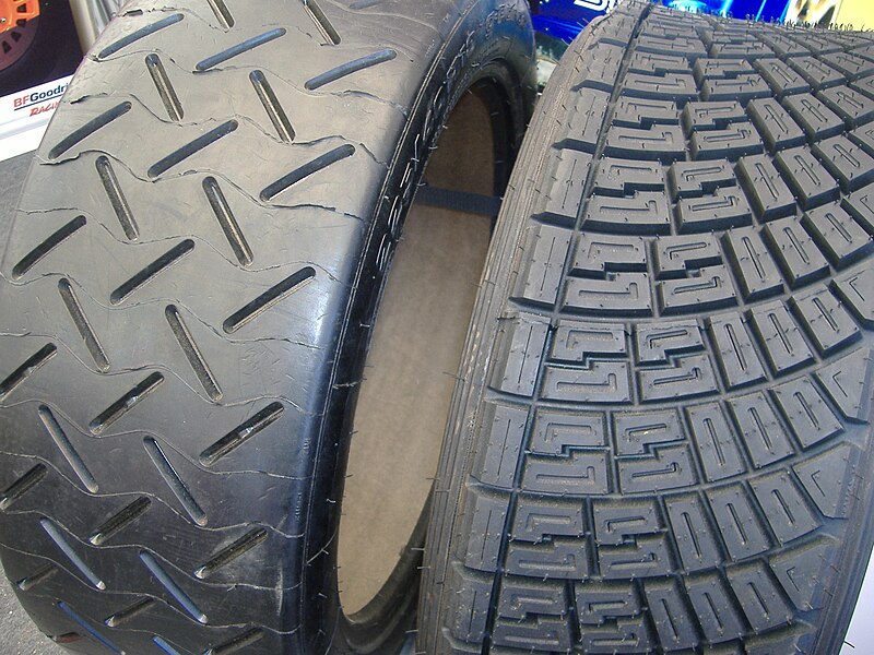 Two rally tires with hairs. Unveiling why do tires have hairs. 