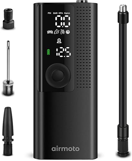 Airmoto portable tire inflator with a sleek black design, digital display showing PSI, BAR, KPA, and Kg/cm², and multiple nozzle attachments for inflating car tires, bicycles, sports balls, and more. The device features a compact build with an easy-to-use interface, making it a budget-friendly option for emergency tire inflation.
